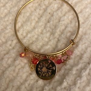 NEW gold bracelet with gold dandelion charm, pink butterfly and pink beads.